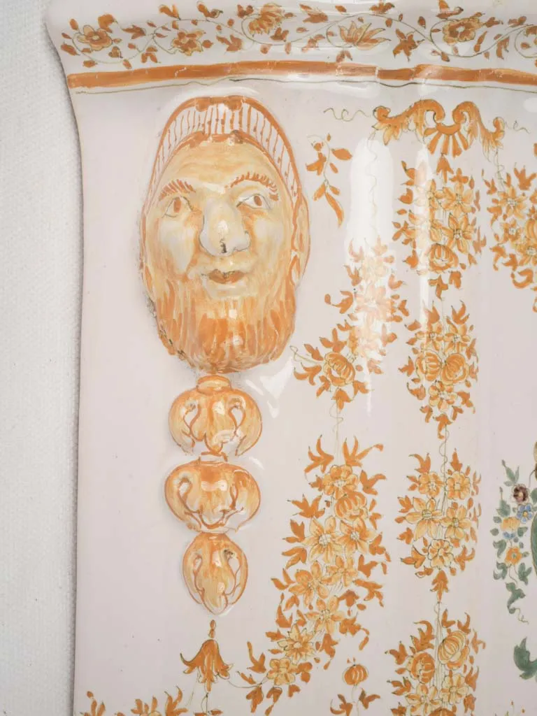 18th-century hand-painted yellow ceramic Moustier wall fountain